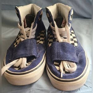 Men Vans size 11.5 black and white checkers, blue jean main color.